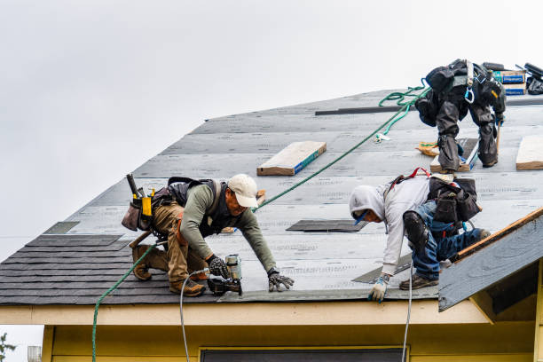 Professional Gutter Installation technician working in Rye, NY